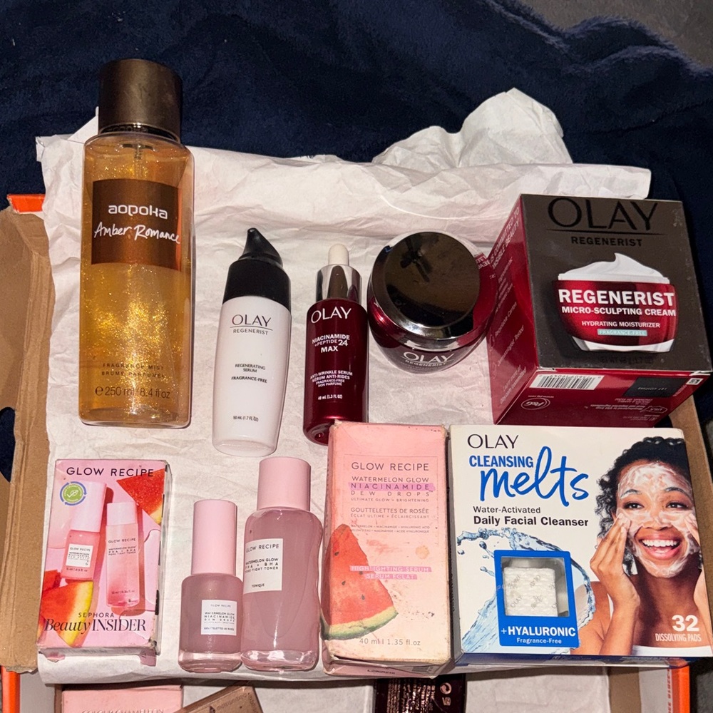 OLAY Skincare Collection with Red and White Accents